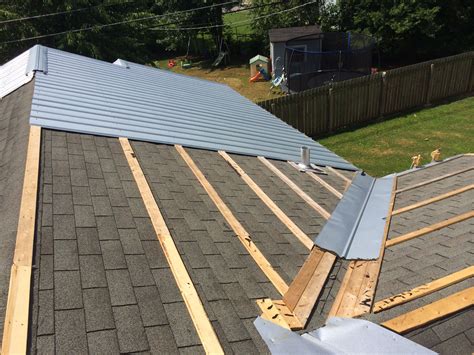 metal roof attached to house|proper installation of metal roof.